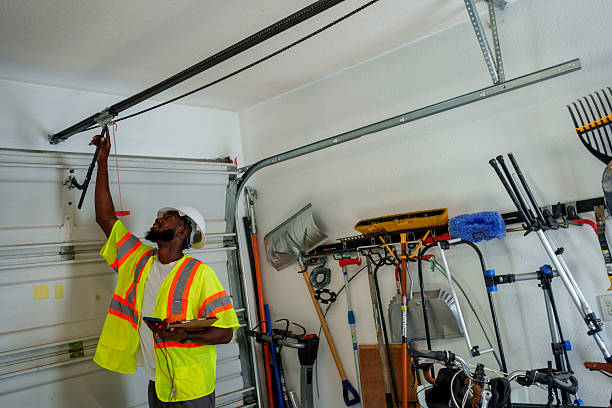 Professional Garage Door Installation technician working in Mechanicville, NY